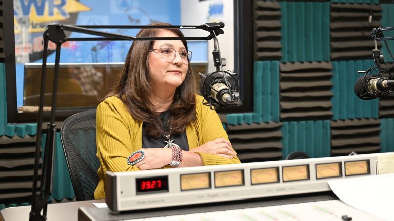 Dr. Deborah Jackson-Dennison in the KXWR Warrior Radio studio during a Diné College Pell Grant update interview.